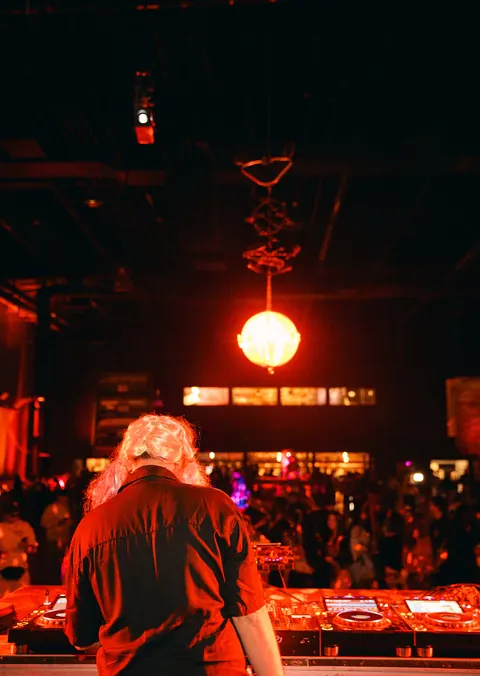 DJ at the decks, Halloween NYC past edition